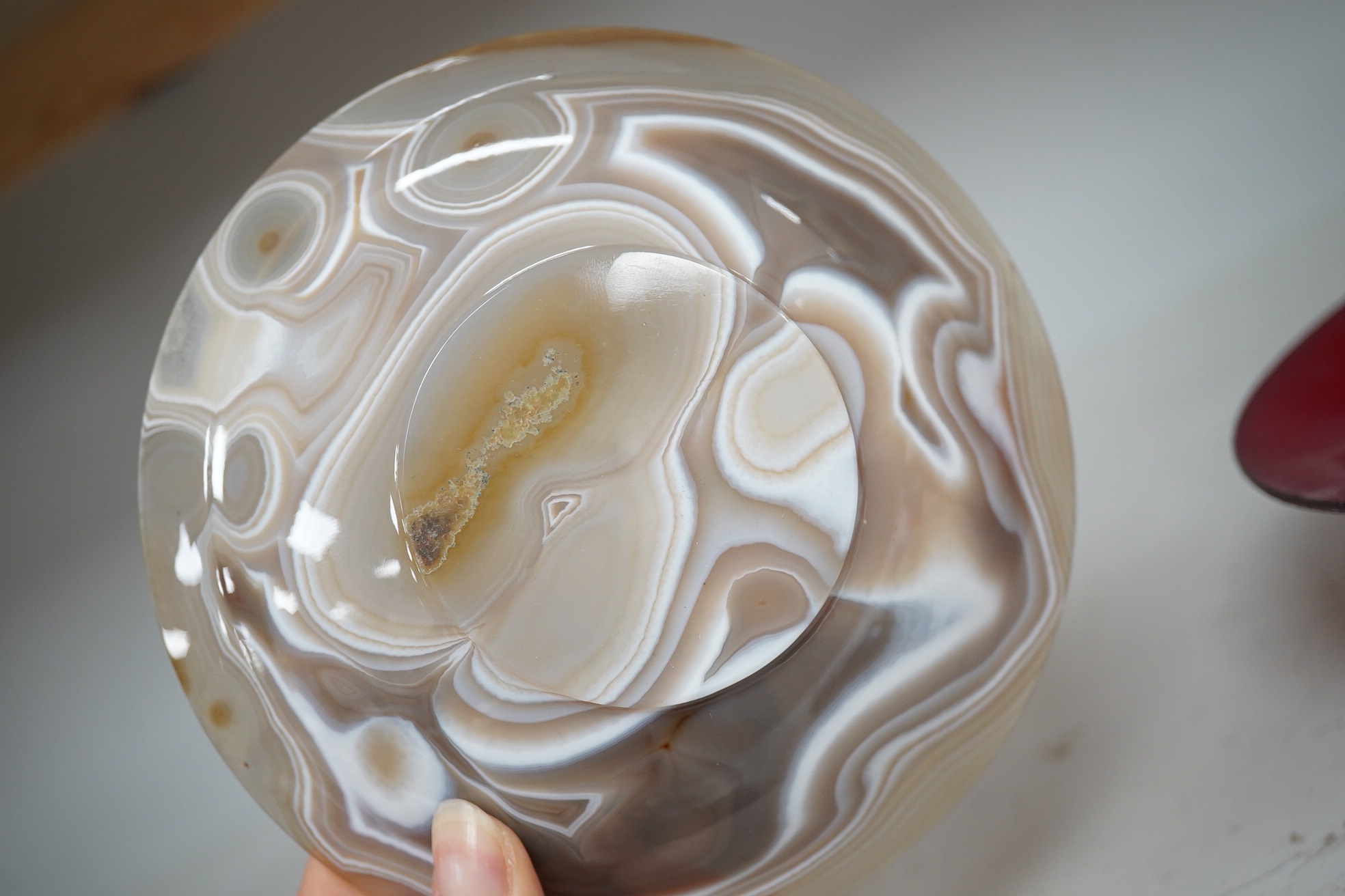 Two iridescent WMF art glass bowls and a polished agate bowl (3). Widest WMF bowl 16.5cm diameter. Condition - good